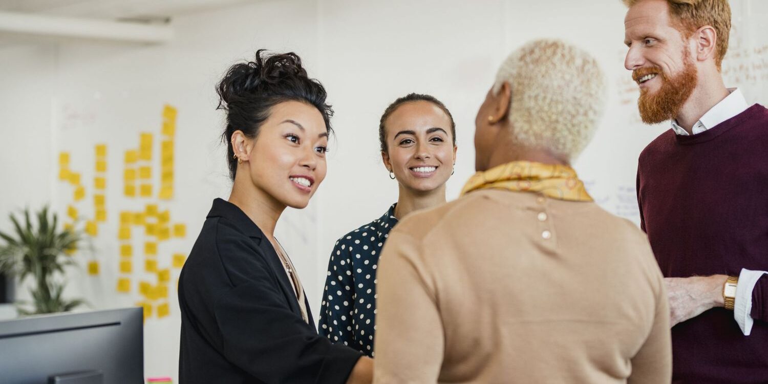 coworkers enjoying a conversation in positive environment